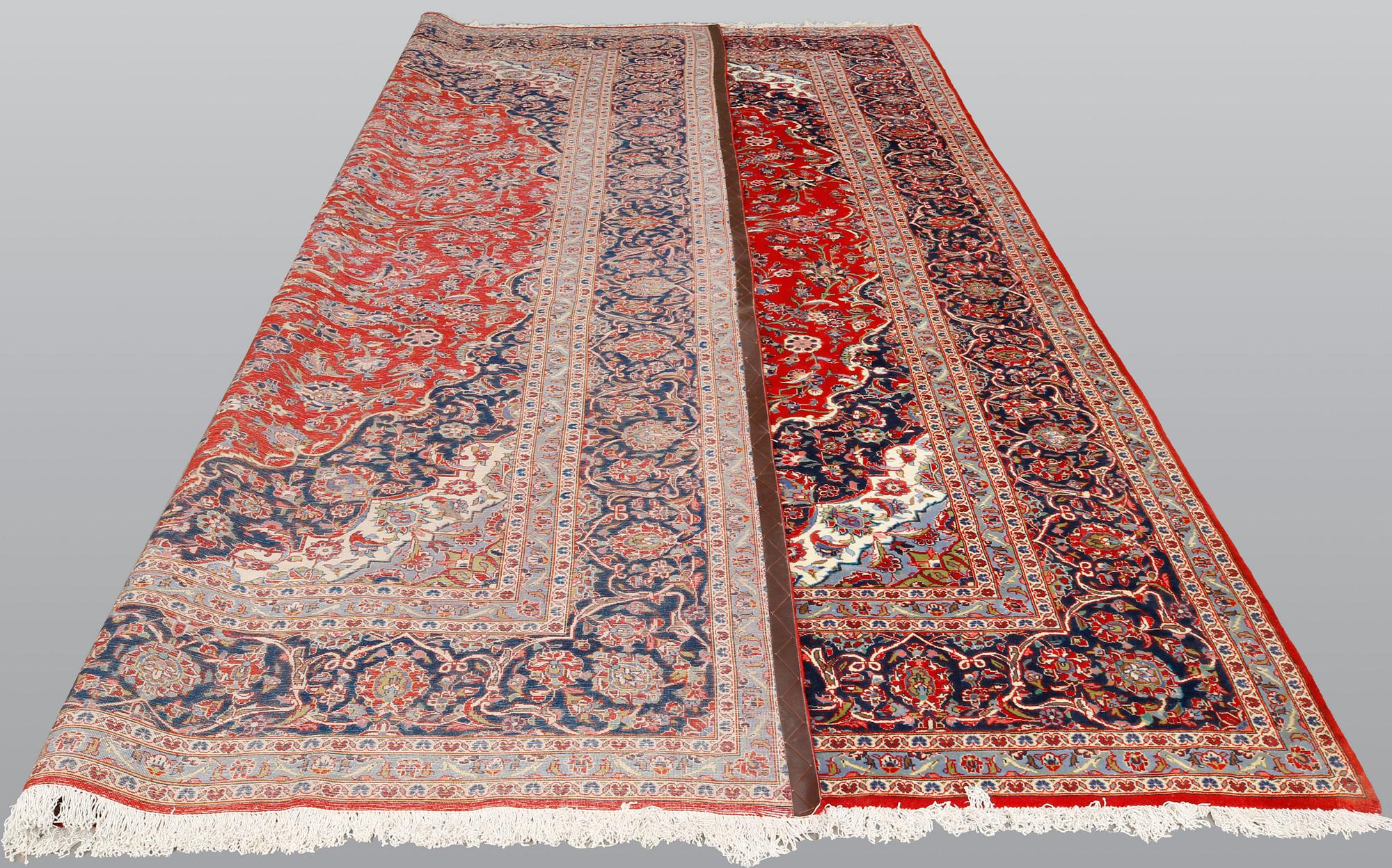 A Kashan carpet, ca 425 x 297 cm.