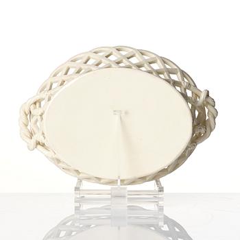 A latticed creamware chestnut basket with stand, 19th century.