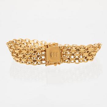An 18C gold bracelet weight 22,5 grams, length 18 cm.