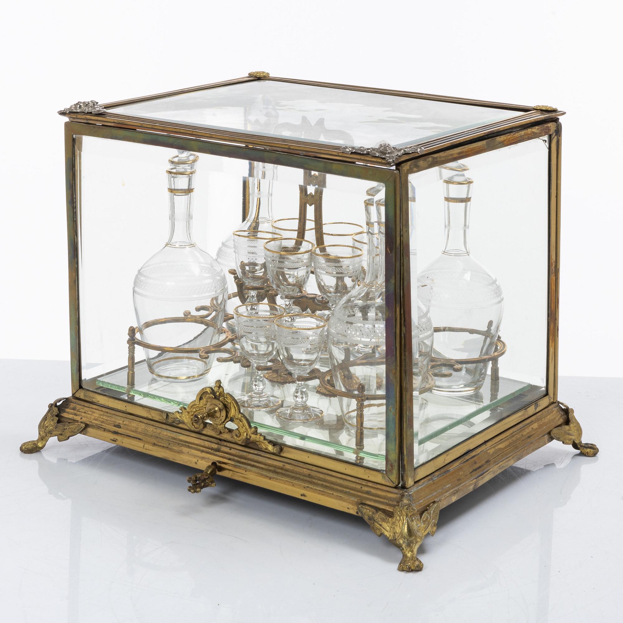 Liqueur set, glass and brass, first half of the 20th century.