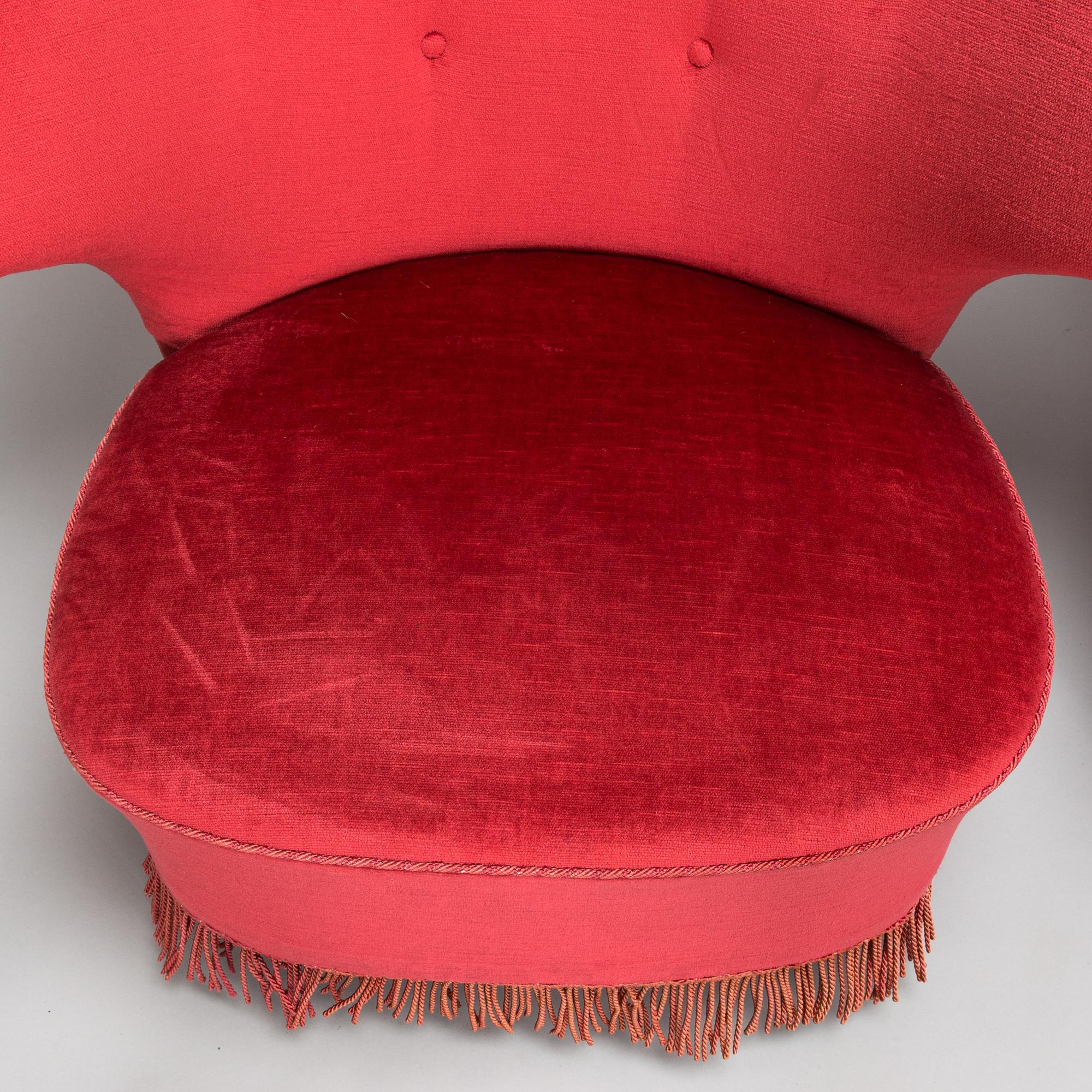 A mid-20th -century sofa and armchair.