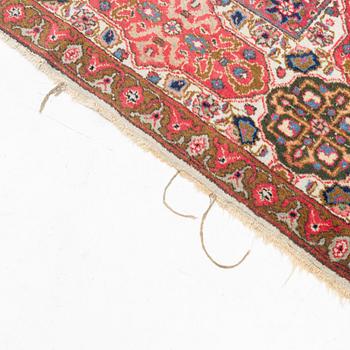 A Tabriz carpet, c. 390 x 305 cm.