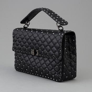 A bag by Valentino, "Rockstud Spike".