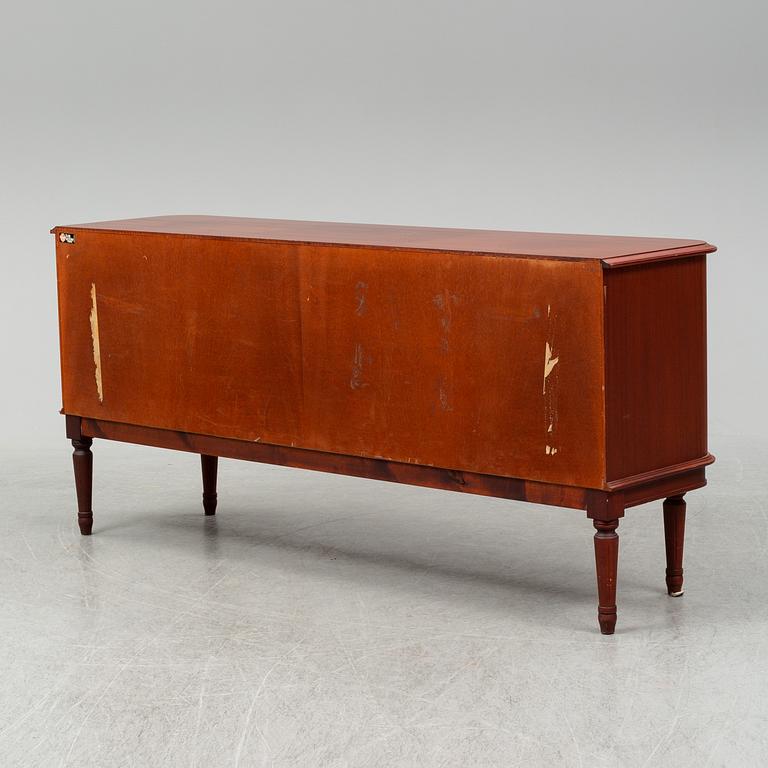 a late 20th Century sideboard.