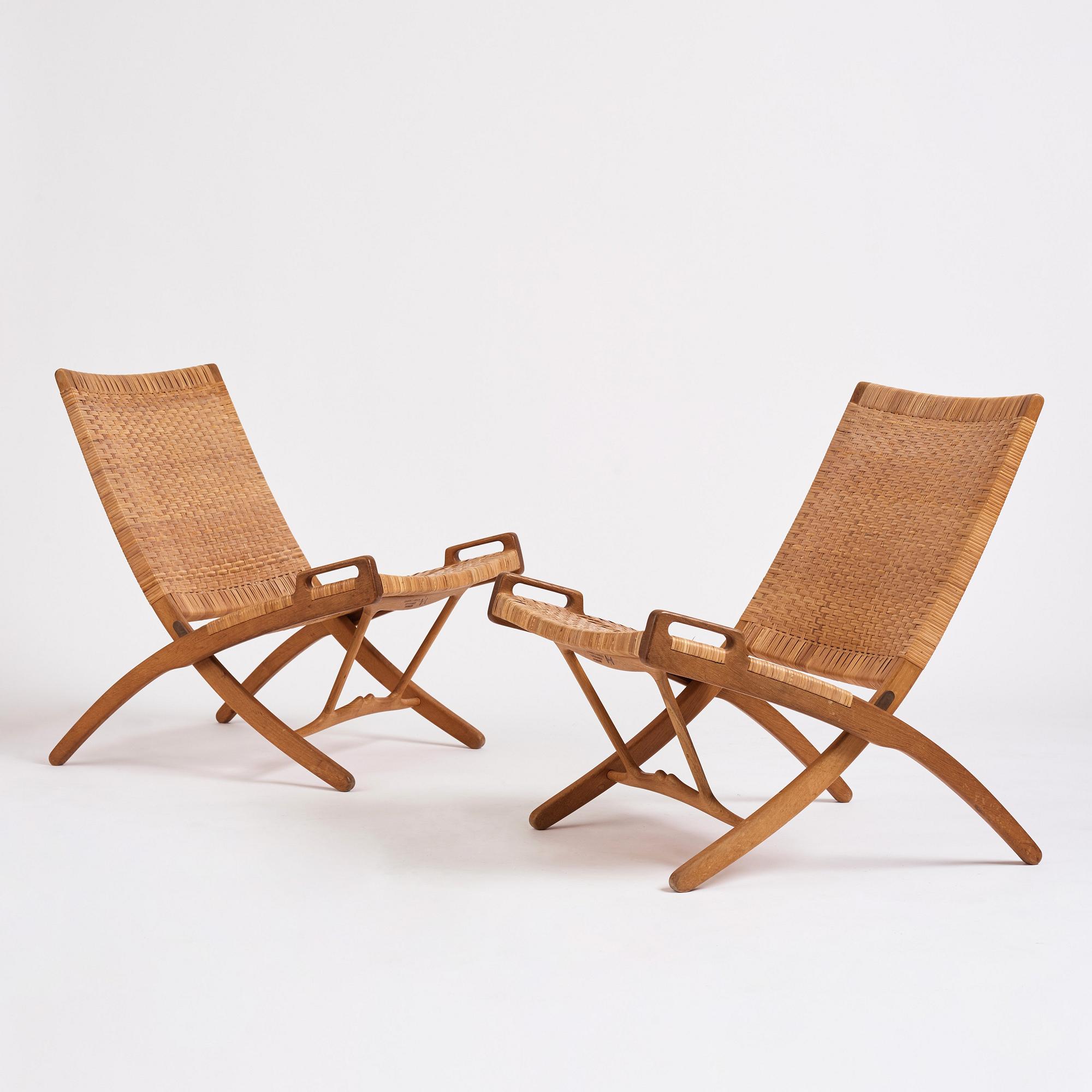 Hans J. Wegner, a pair of oak and rattan folding chairs 'JH-512', Johannes Hansen, Denmark 1950-60s.