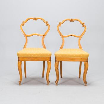 A pair of rococo revival chairs. Latter part of 19th century.