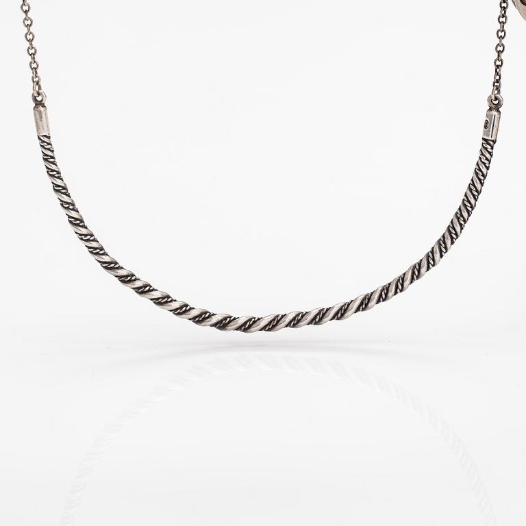 A sterling silver necklace "Twined jewellery from Lampola in Halikko". Kalevala koru, Helsinki 1992.