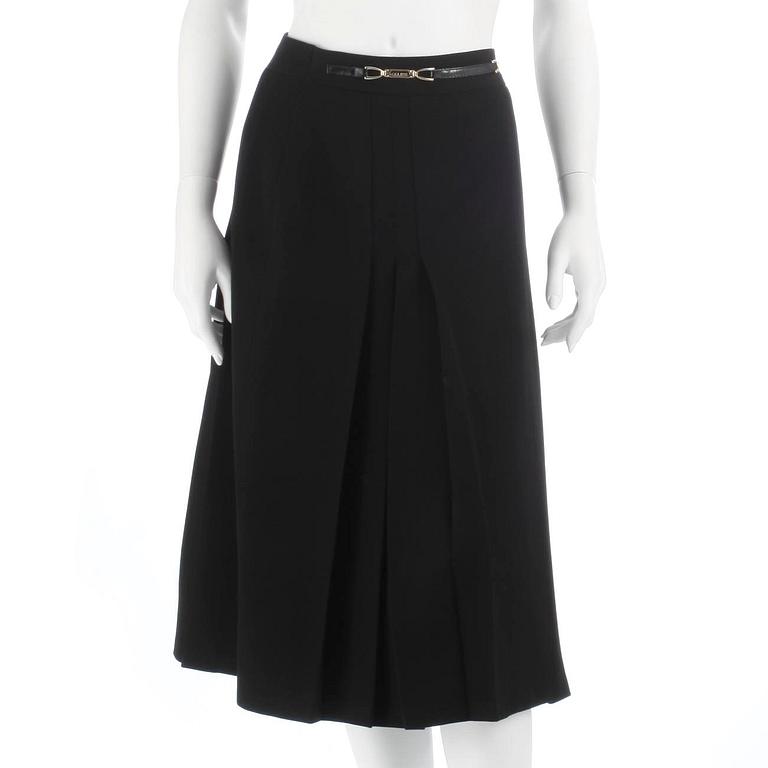 CÉLINE, a green wool skirt. Size 42.