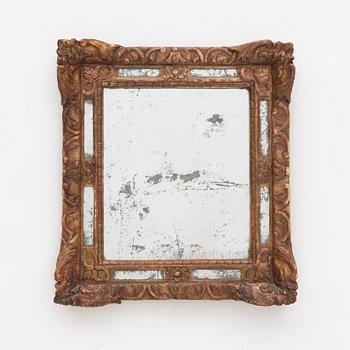 A Baroque mirror, France, 18th Century.
