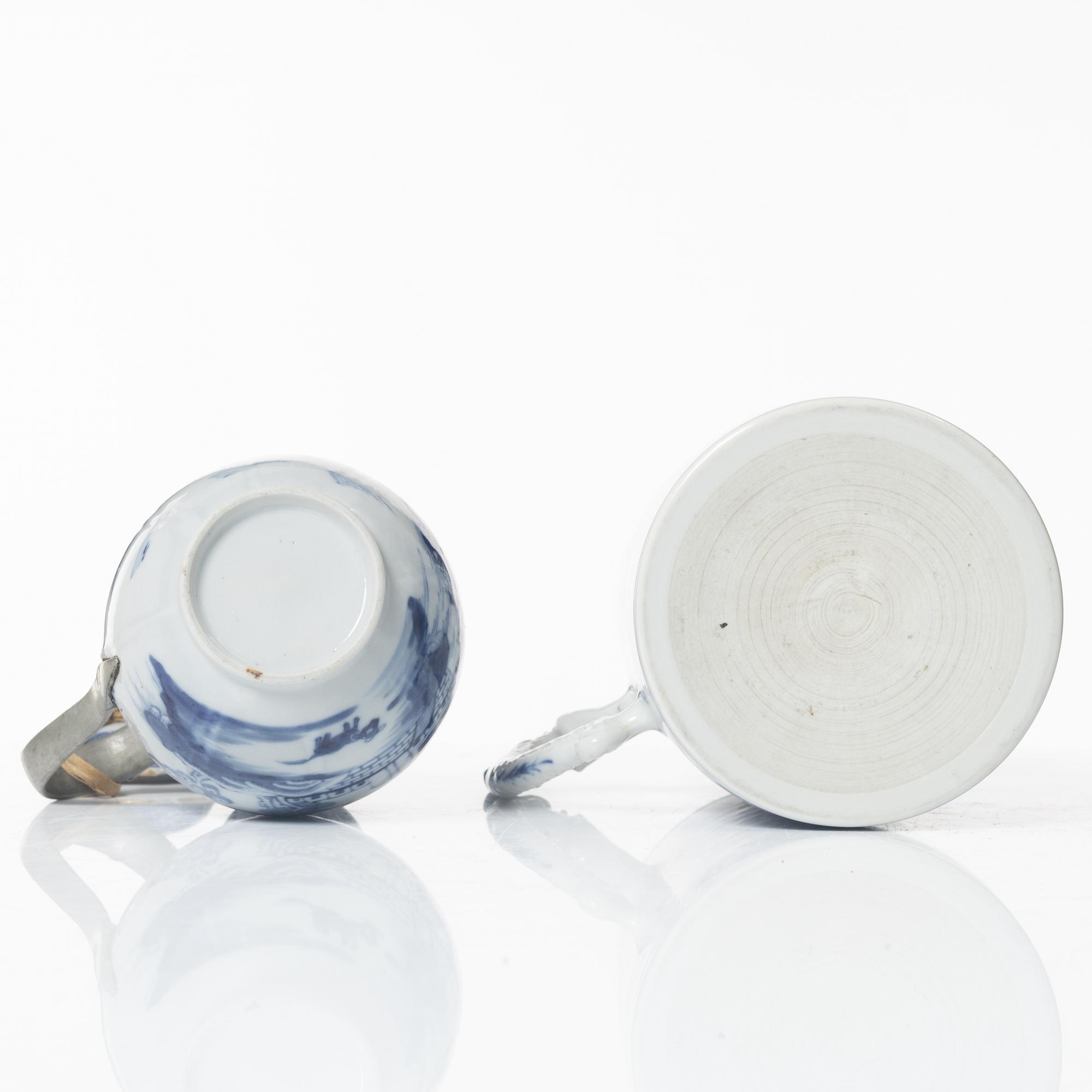 A Chinese blue and white jug, an ewer and three cups, Qing dynasty, Qianlong (1736-95).