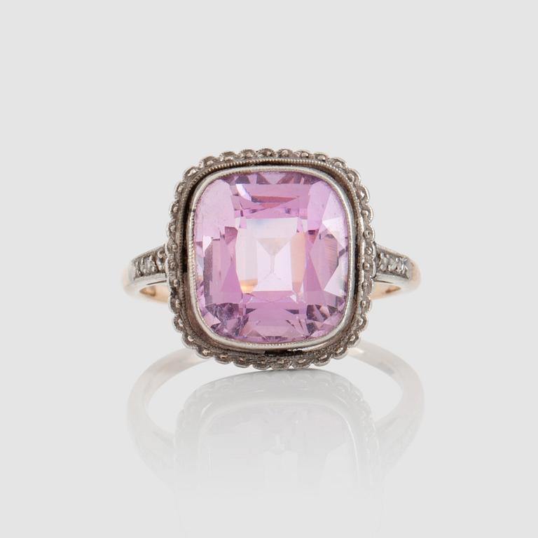 A circa 6.00 cts imperial topaz and rose-cut diamond ring.