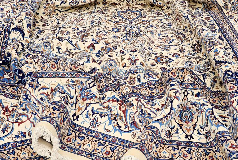 A CARPET, Nain part silk, s.k 9 LAA, 588 x 393 cm.