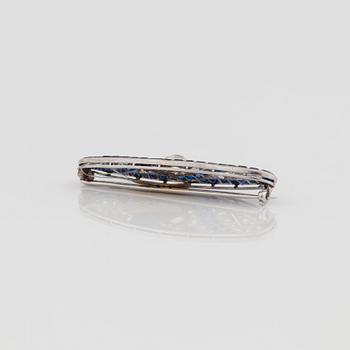 A carré cut sapphire and old cut diamond brooch. Total carat weight of diamonds circa 1.70 cts.
