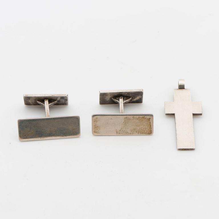 Cross and a couple of silver cuffs, Wiwen Nilsson Lund.