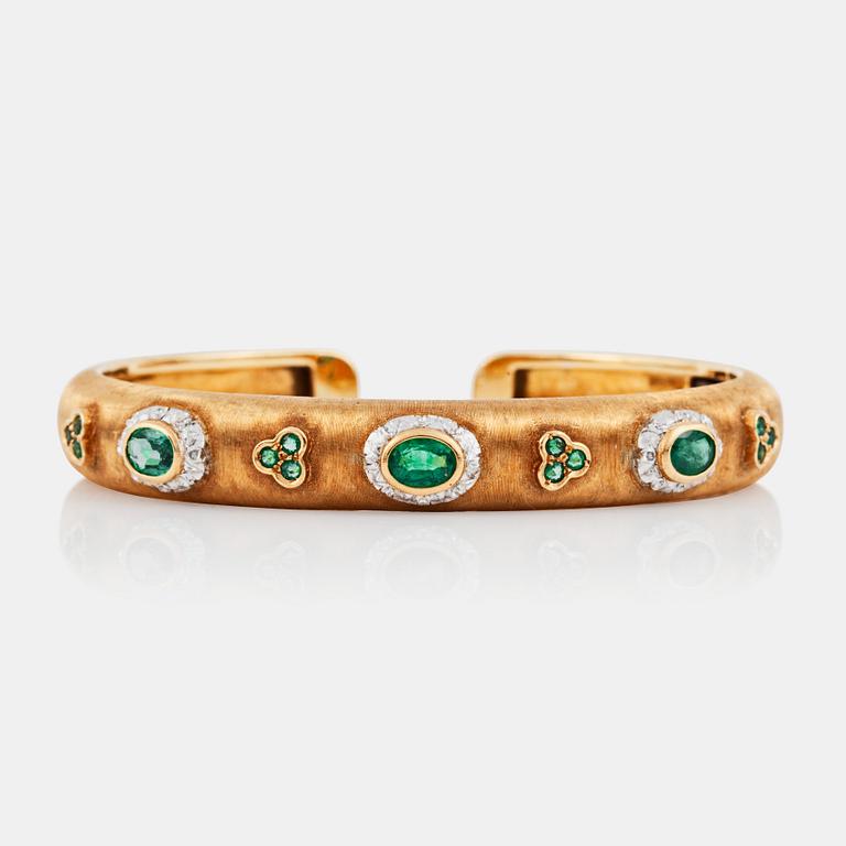 An emerald bracelet signed M. Buccellati.