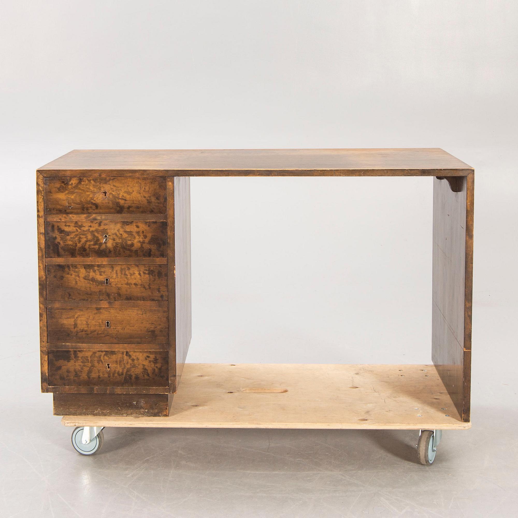 A 1930s birch desk.