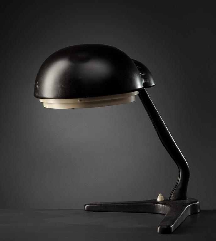 An Alvar Aalto table lamp, manufactured by Valaistustyö, Finland 1950's, model A 704.