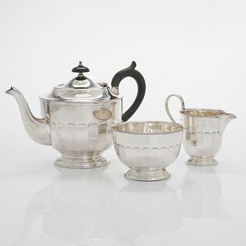 A three-piece 1930s sterling silver tea set, Sheffield, England.