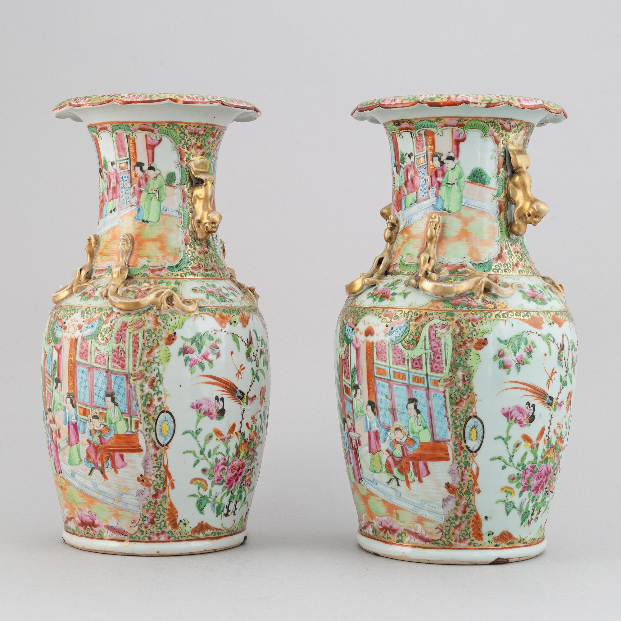 A pair of famille rose Canton vases, Qing dynasty, late 19th century.