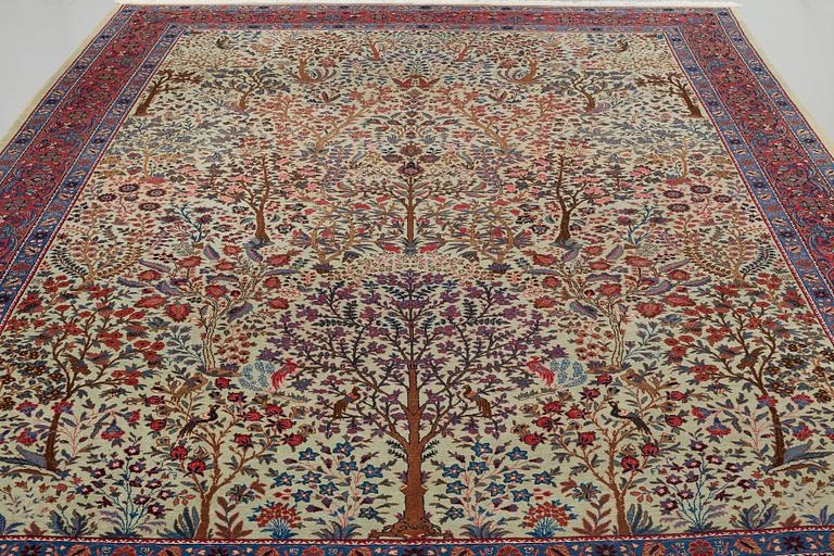 A CARPET, a semi-antique Tabriz probably, ca 393 x 284 cm.