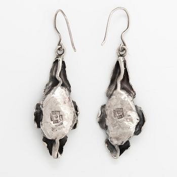 Reino Saastamoinen, A pair of sterling silver earrings with zoisites with ruby crystals. Helsinki 1970.