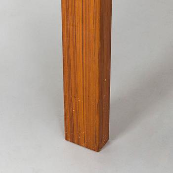 A mid-20th century dining table.