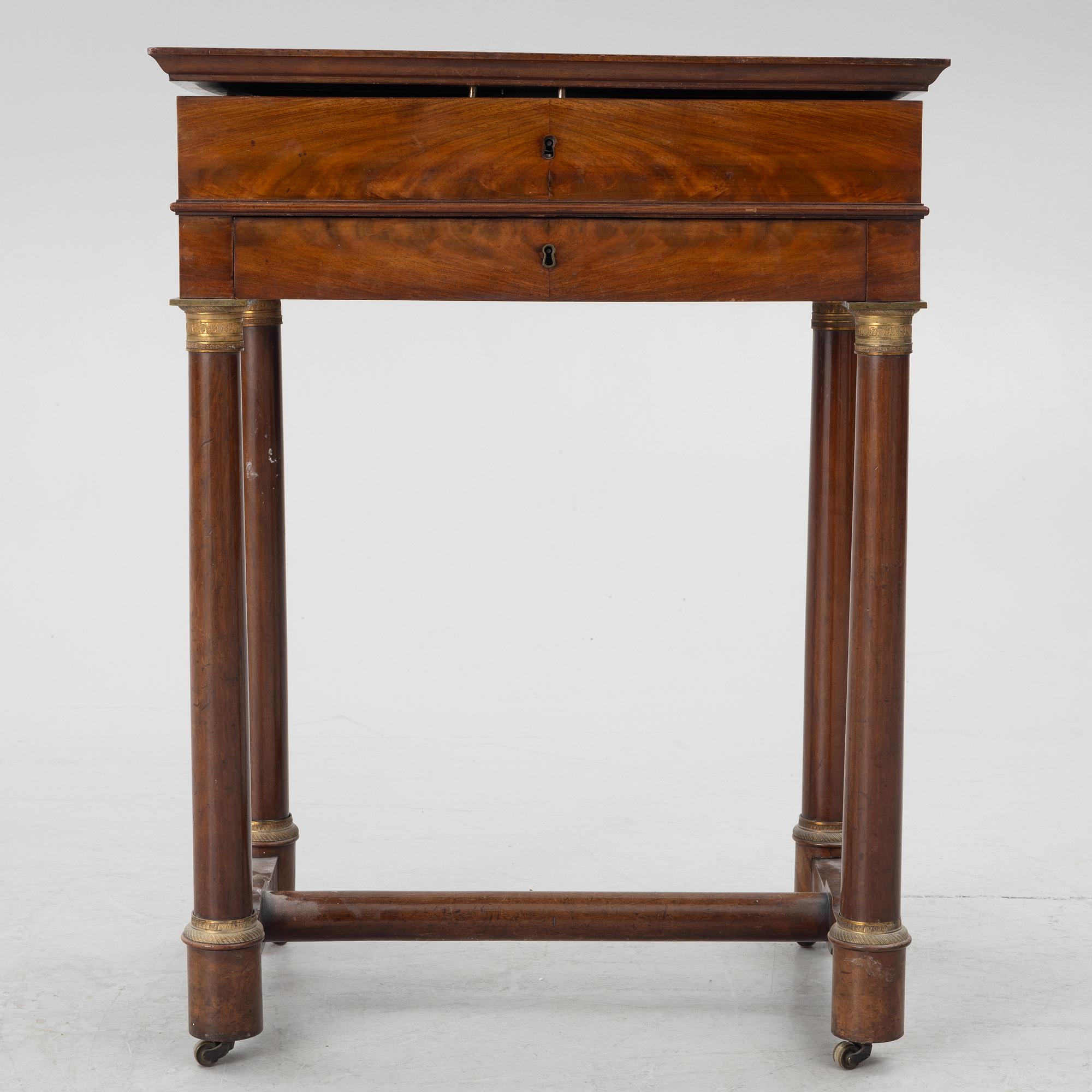 A French Empire mahogany sewing table, first part 19th century.