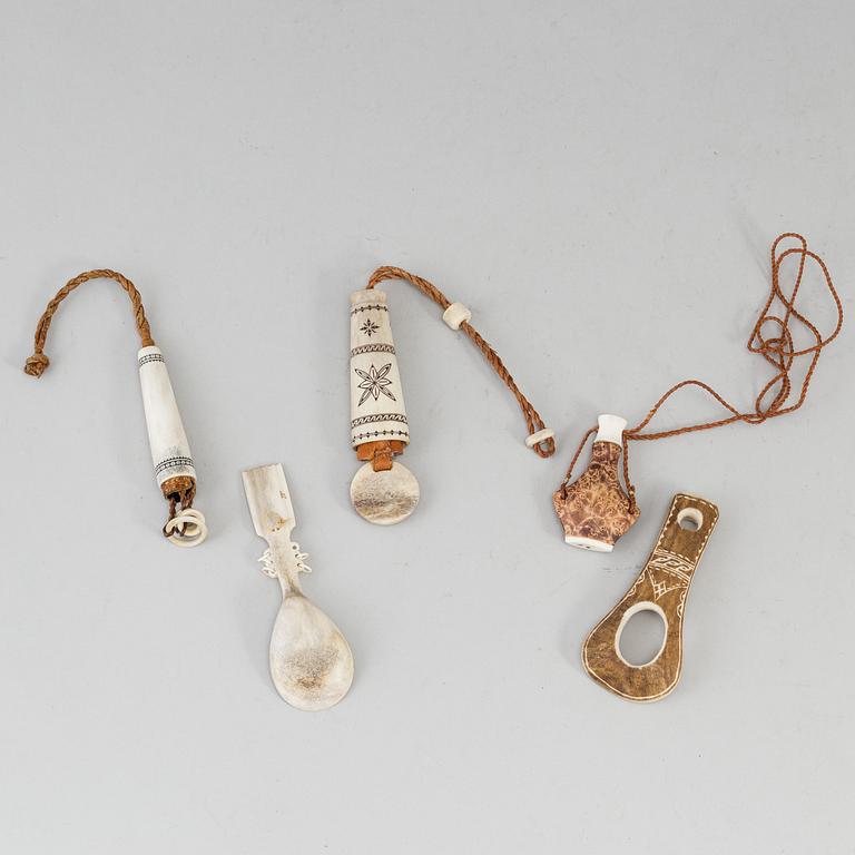 Five Sami reindeer horn items, signed.