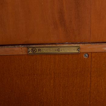 HYLLSYSTEM / BOKHYLLA, 9 delar, mahognyfanér, Carl-Axel Acking, för NK, 1900-talets mitt, signerad.