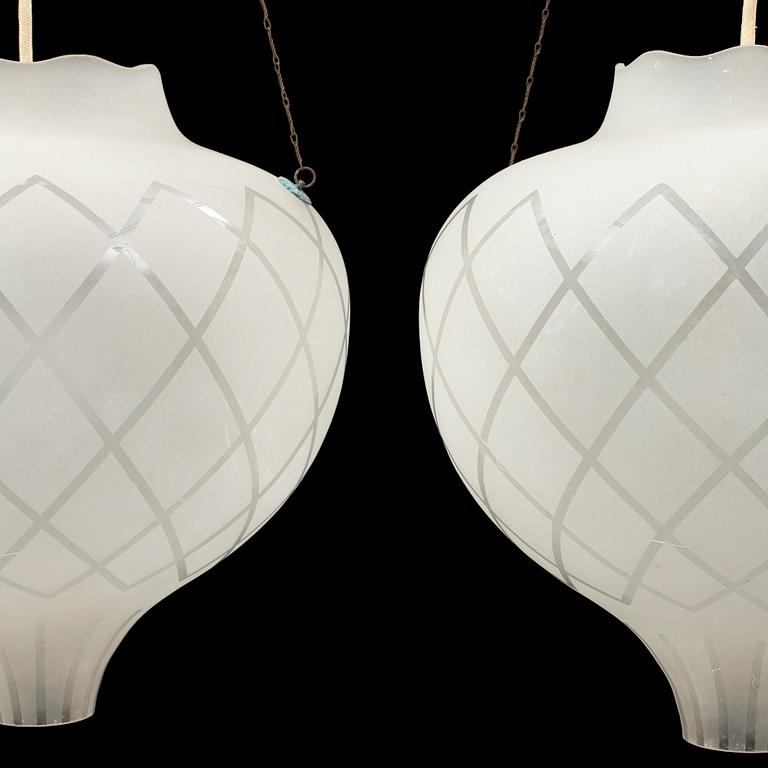 A pair of ceiling lights, probably 1940s.