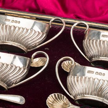 An English set of four silver salters with spoons mark of James Dixon & sons Sheffield 1895, weight 166 gr.