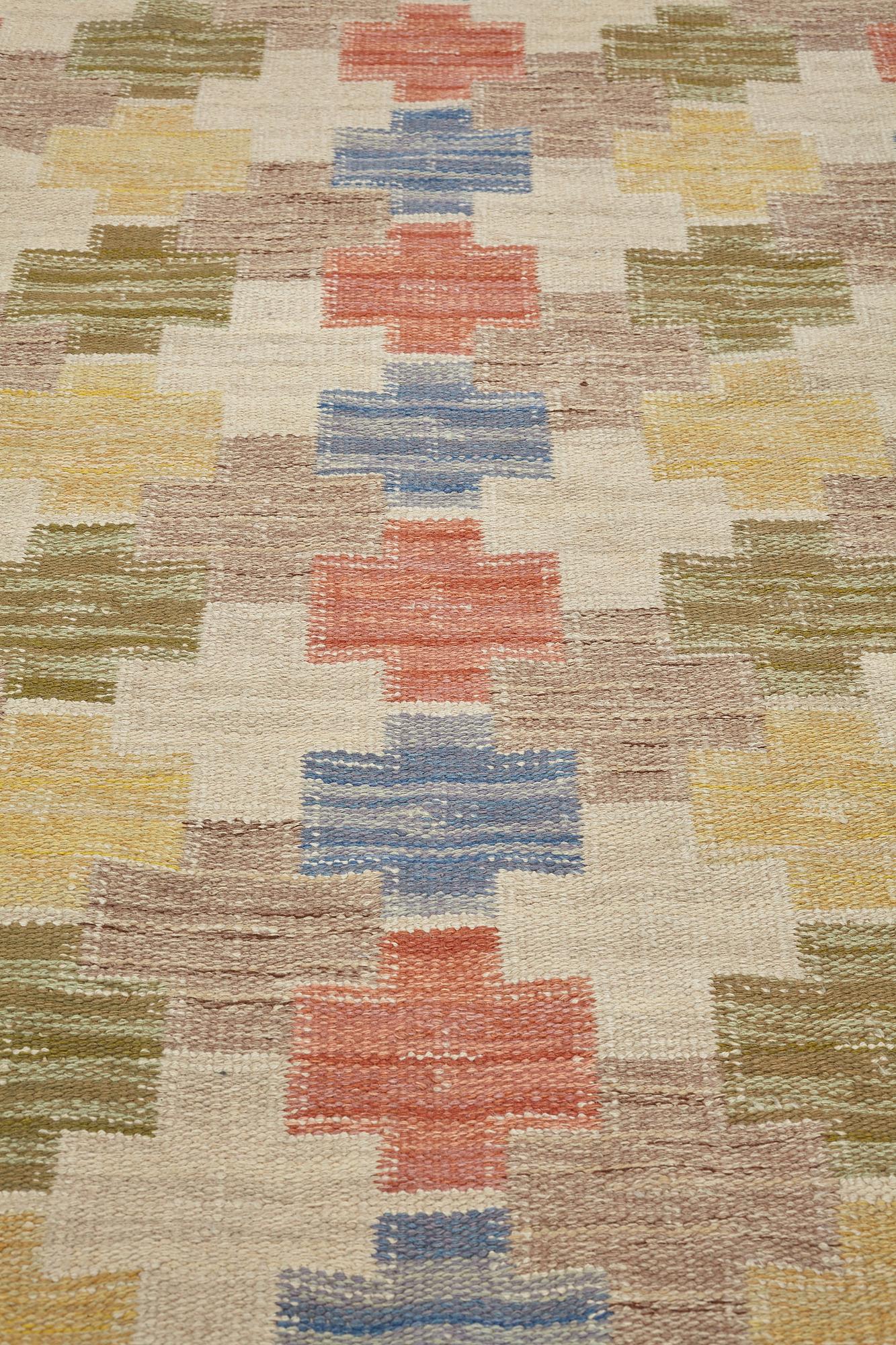 Swedish design, a carpet, knotted pile in relief, ca 178,5-179,5 x 137-140,5 cm, signed and dated at the back: SKLH 1944.