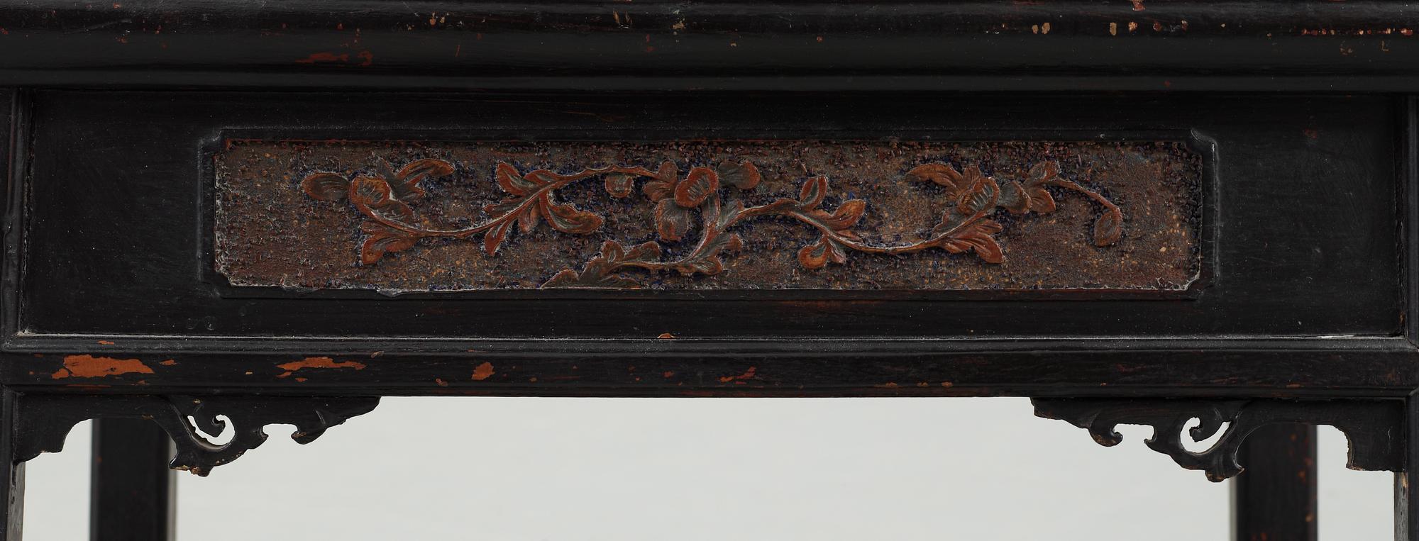 A black and red lacquered wooden chair, Qing dynasty.