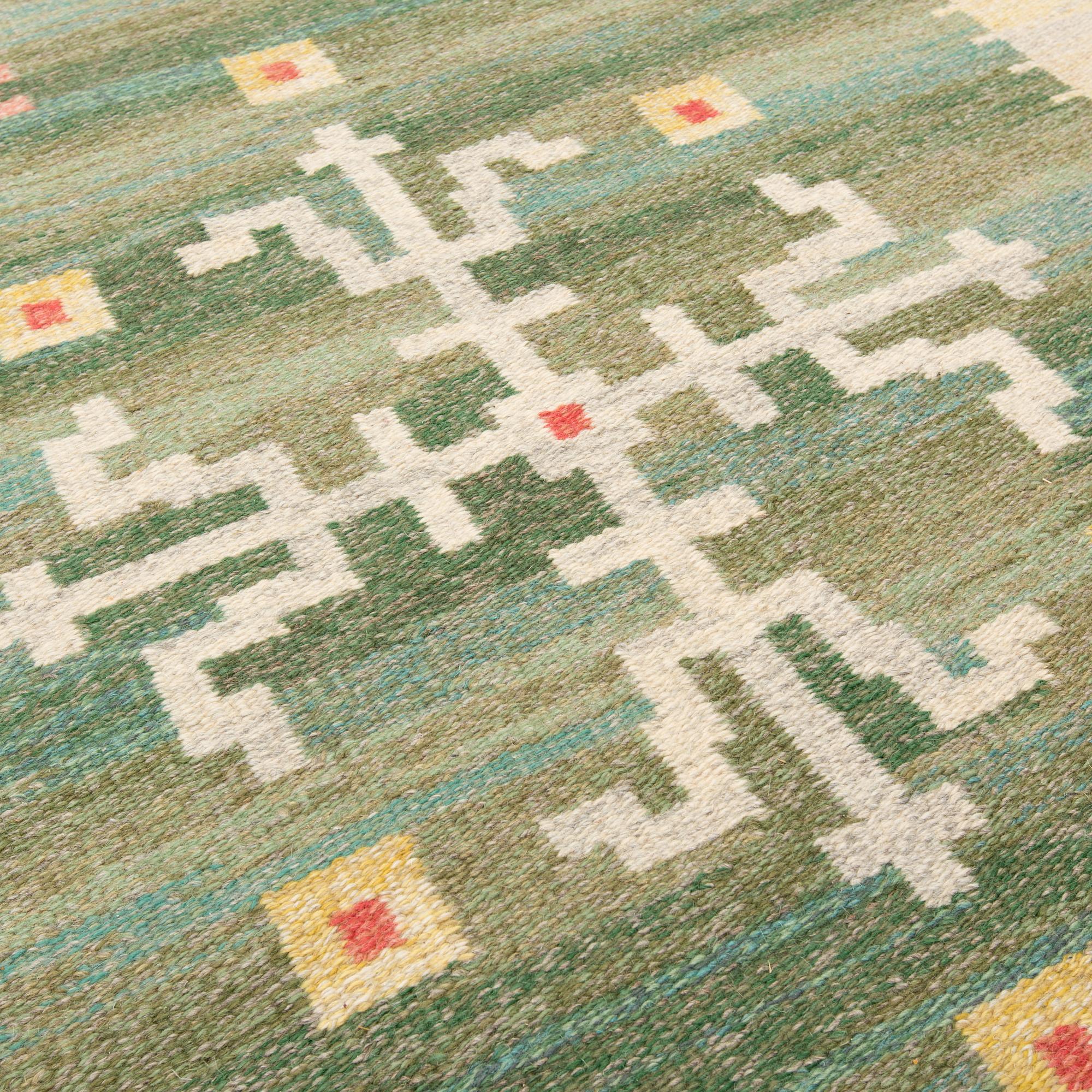 A CARPET, flat weave, ca 262,5 x 177 cm, signed CD (Carl Dangel).