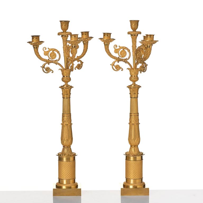 Kandelabrar, ett par, för fyra ljus, av Pierre Chibout, Paris (mästare 1806-1824), Empire.