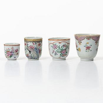 A group of 12 famille rose cups, Qing dynasty, Qianlong (1736-95).
