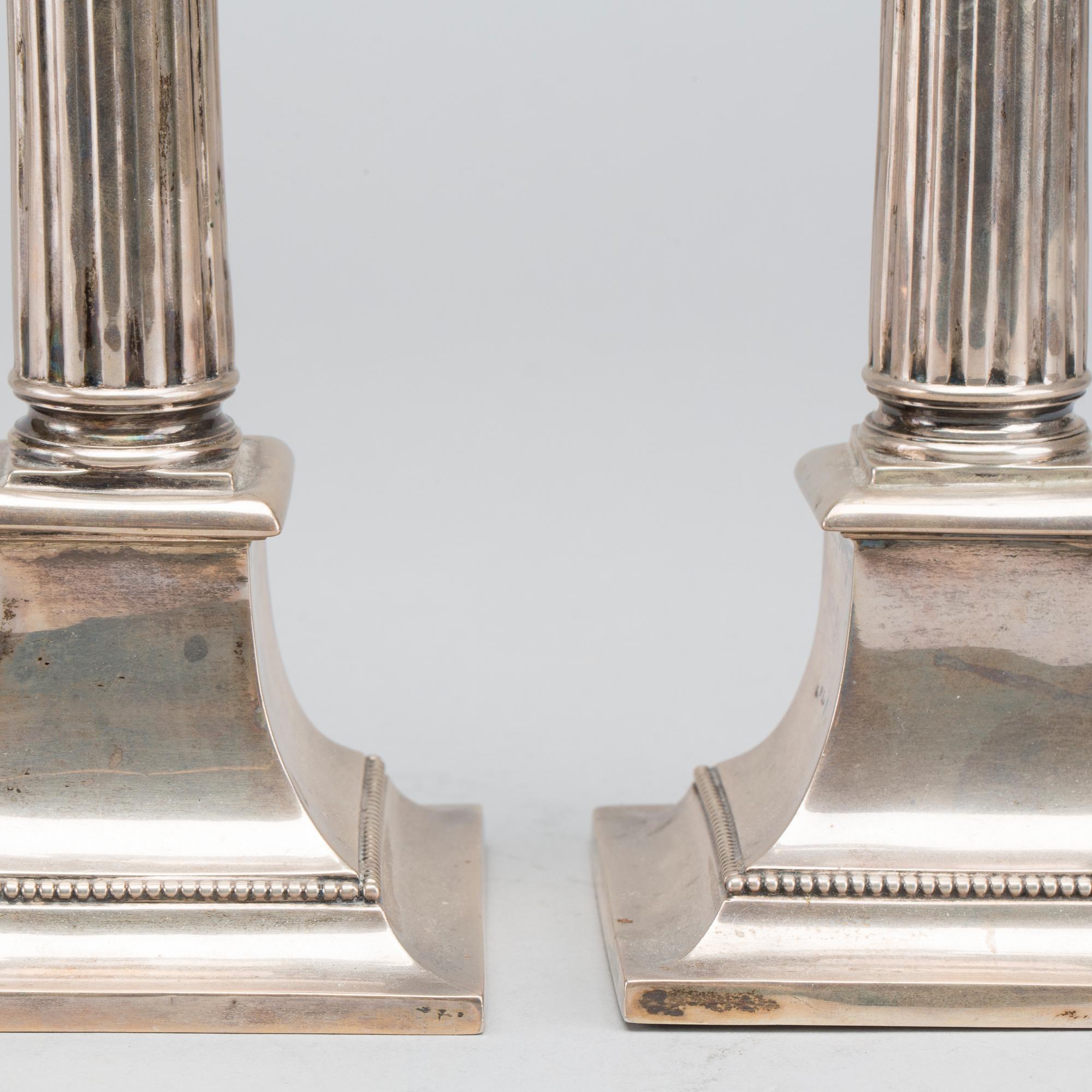 A Swedish pair of 20th century silver candle sticks, mark of K. Andersson Stockholm 1909(?).