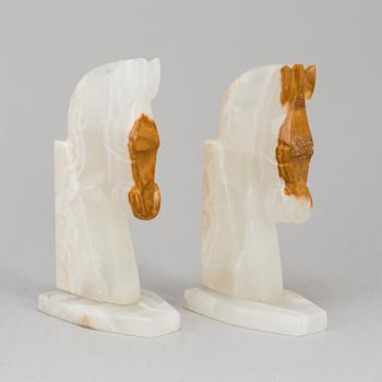 A pair of stone book ends.