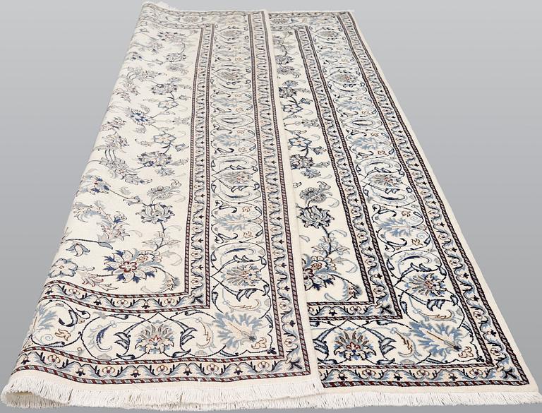 A part silk Nain carpet, ca 305 x 198 cm.