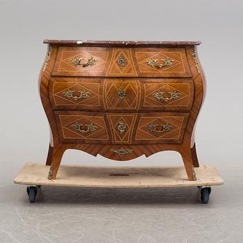 A second half of the 20th century rococo style chest of drawers.