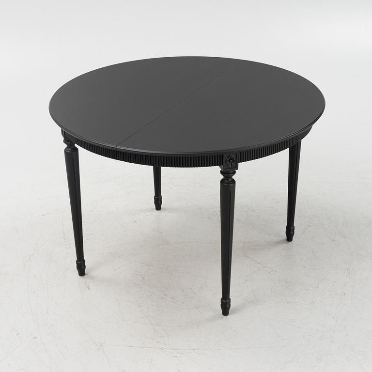 A Gustavian style dining table, mid 20th century.