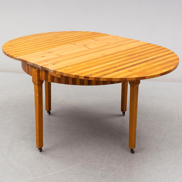 a dining table from the early 20th century.