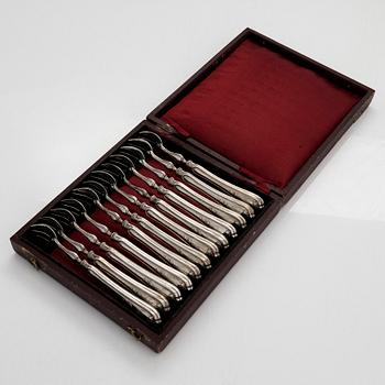 A set of twelve Belgian silver oyster forks.