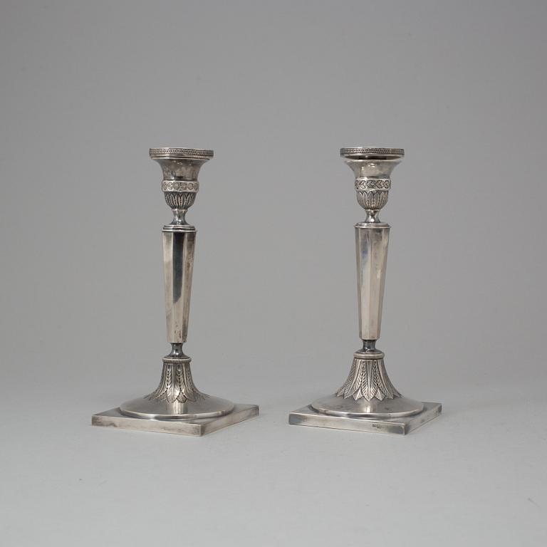 A pair of Russian silver candlesticks, Moscow, 1880, marked LM.