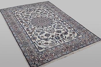 A carpet, Nain, part silk, 9 laa, ca 290 x 196 cm.
