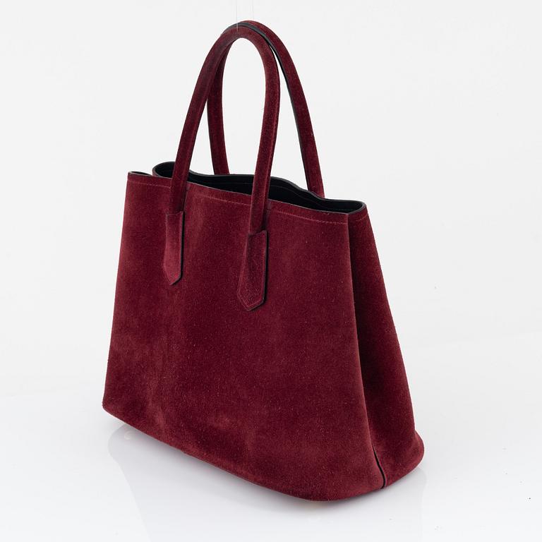 Prada, a suede"Galleria" bag.