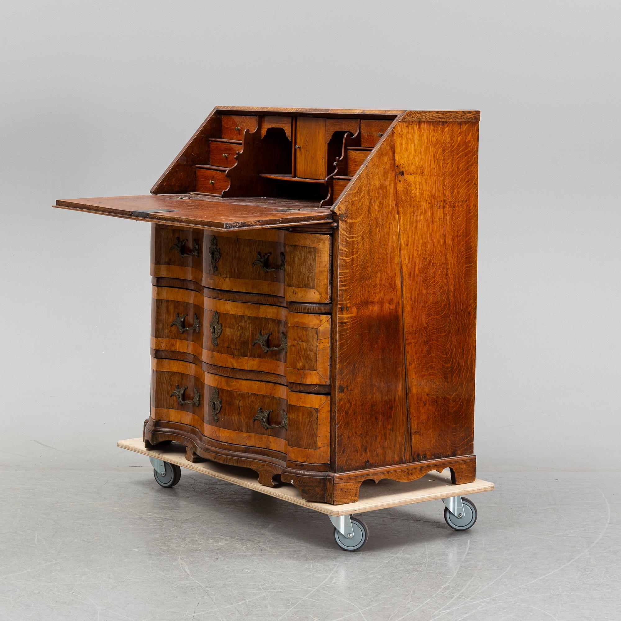 A late baroque secretaire chest of drawers, 18th century, northen Germany.