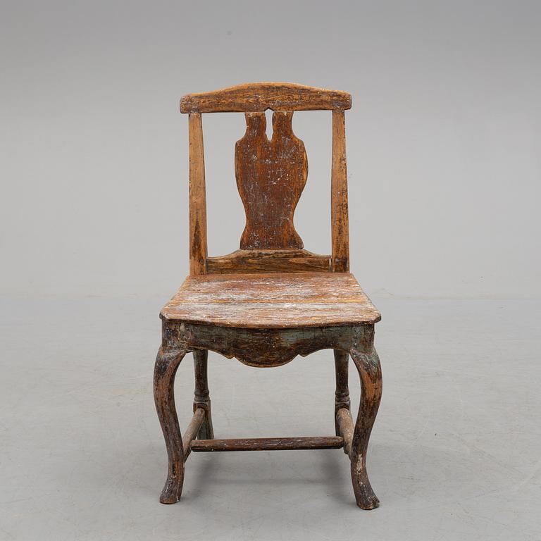 a 18th century wooden chair.