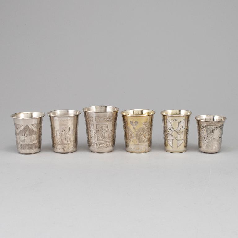 A set of six Russian 19th century parcel-gilt silver vodka cups.