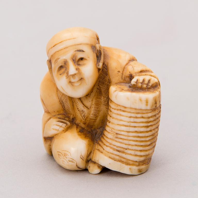 A 19th century Japanese bone netsuke.